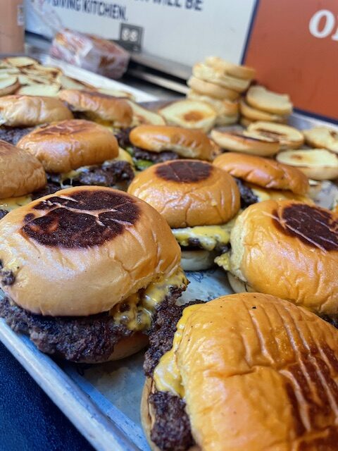 Smiley's Burger Club and Chef Ean support food service workers in crisis through the Atlanta Braves Outfield Market