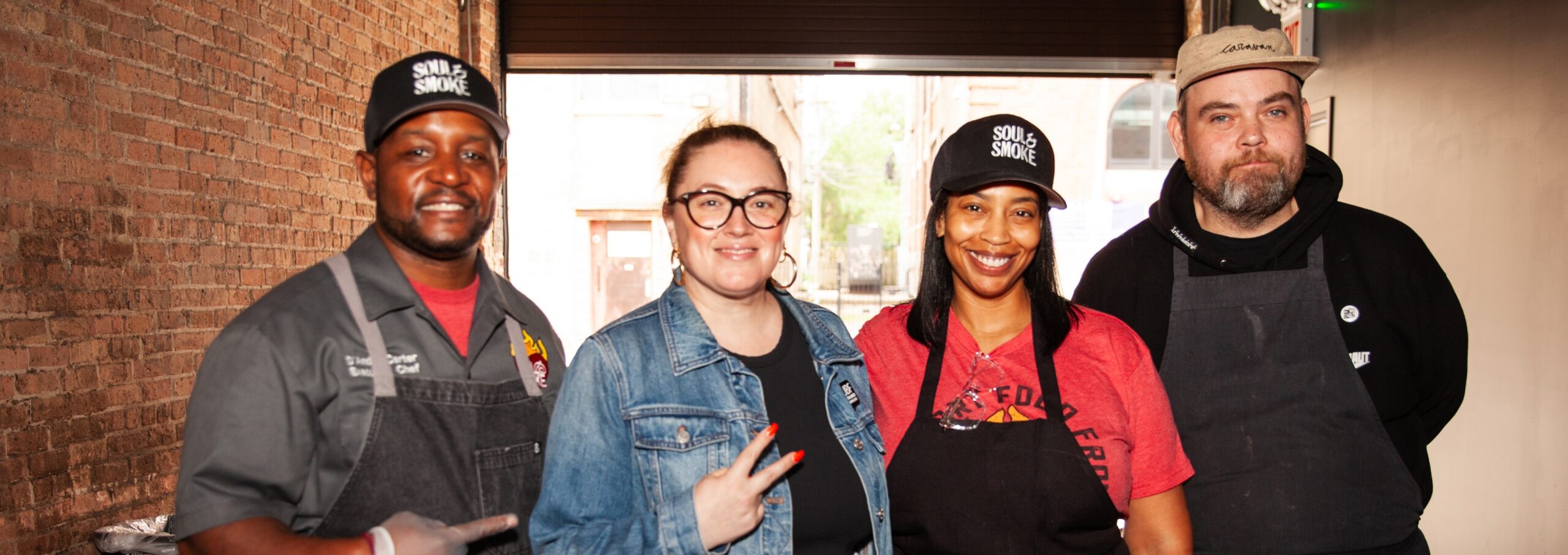 Chefs celebrate at a Giving Kitchen event.