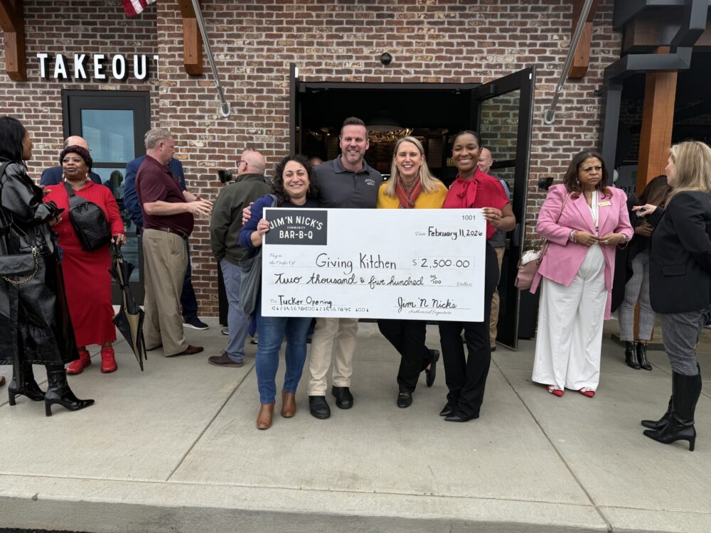 Jim 'N Nick's Tucker Grand opening supporting Giving Kitchen