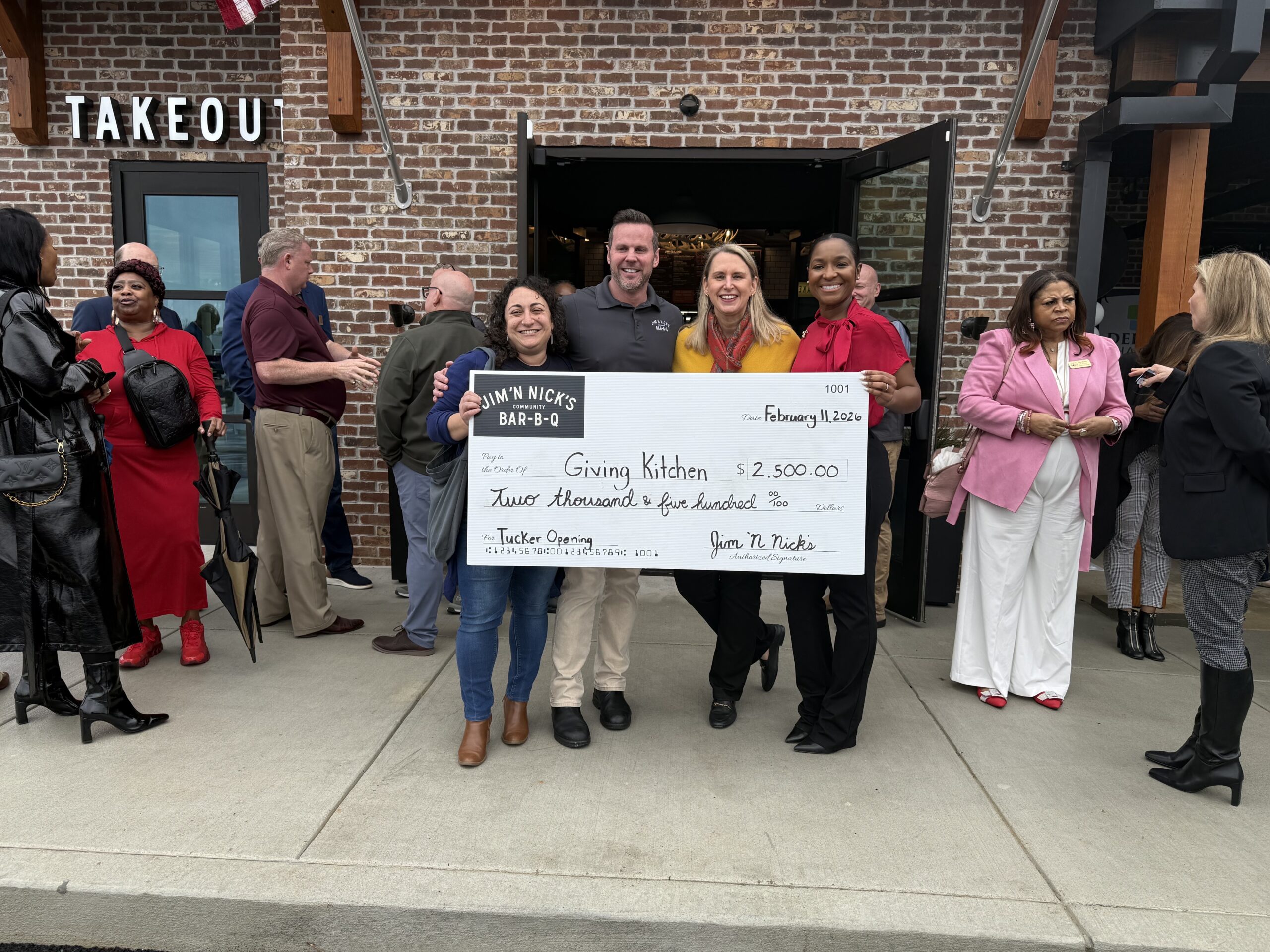 Jim 'N Nick's Tucker Grand opening supporting Giving Kitchen