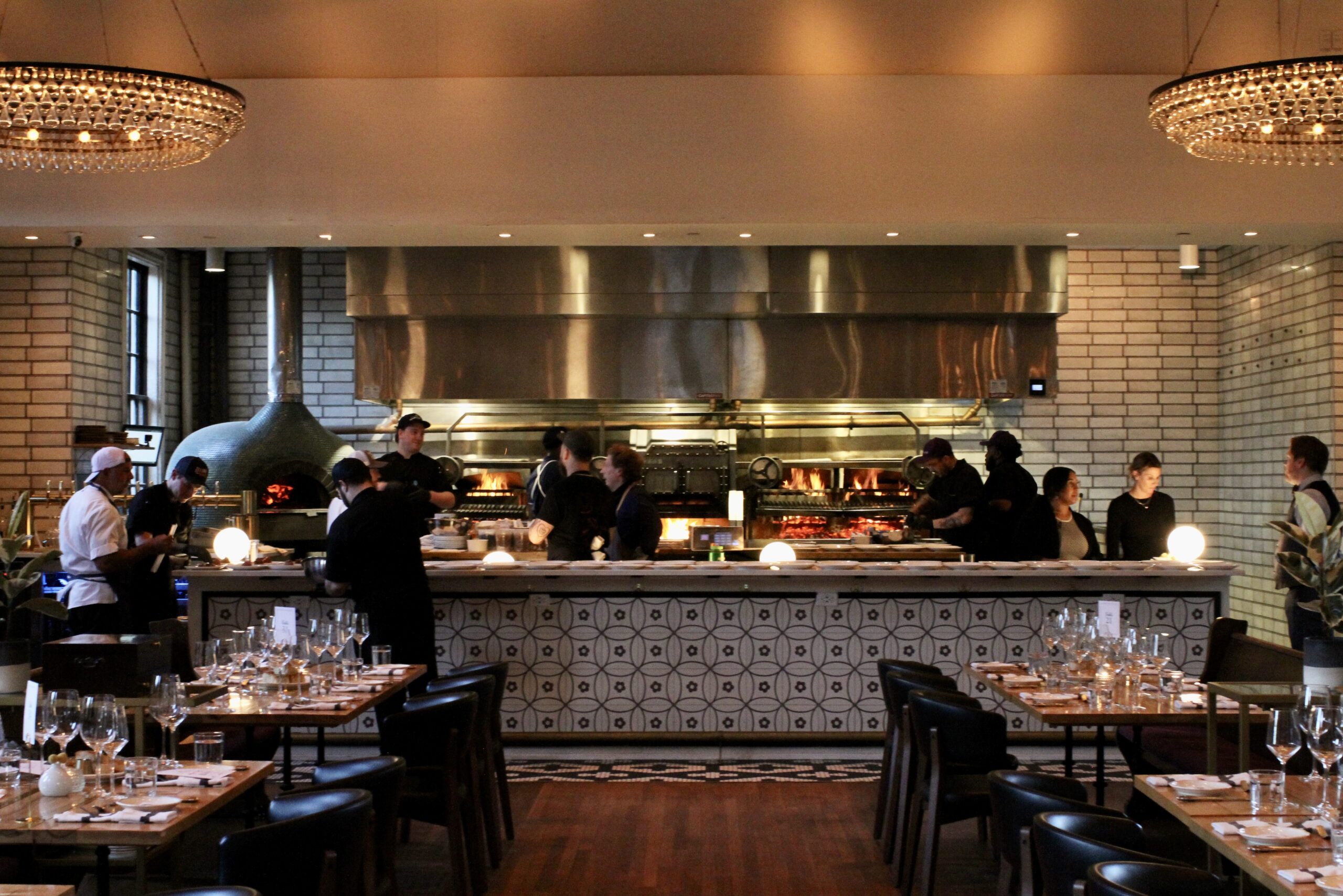 Chefs work in the kitchen at Charlotte Family Meal