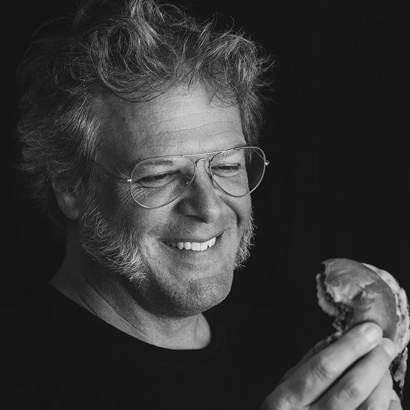 George Motz holding a burger