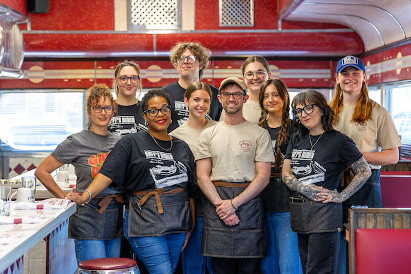Group team photo of restaurant staff at Grey's Diner