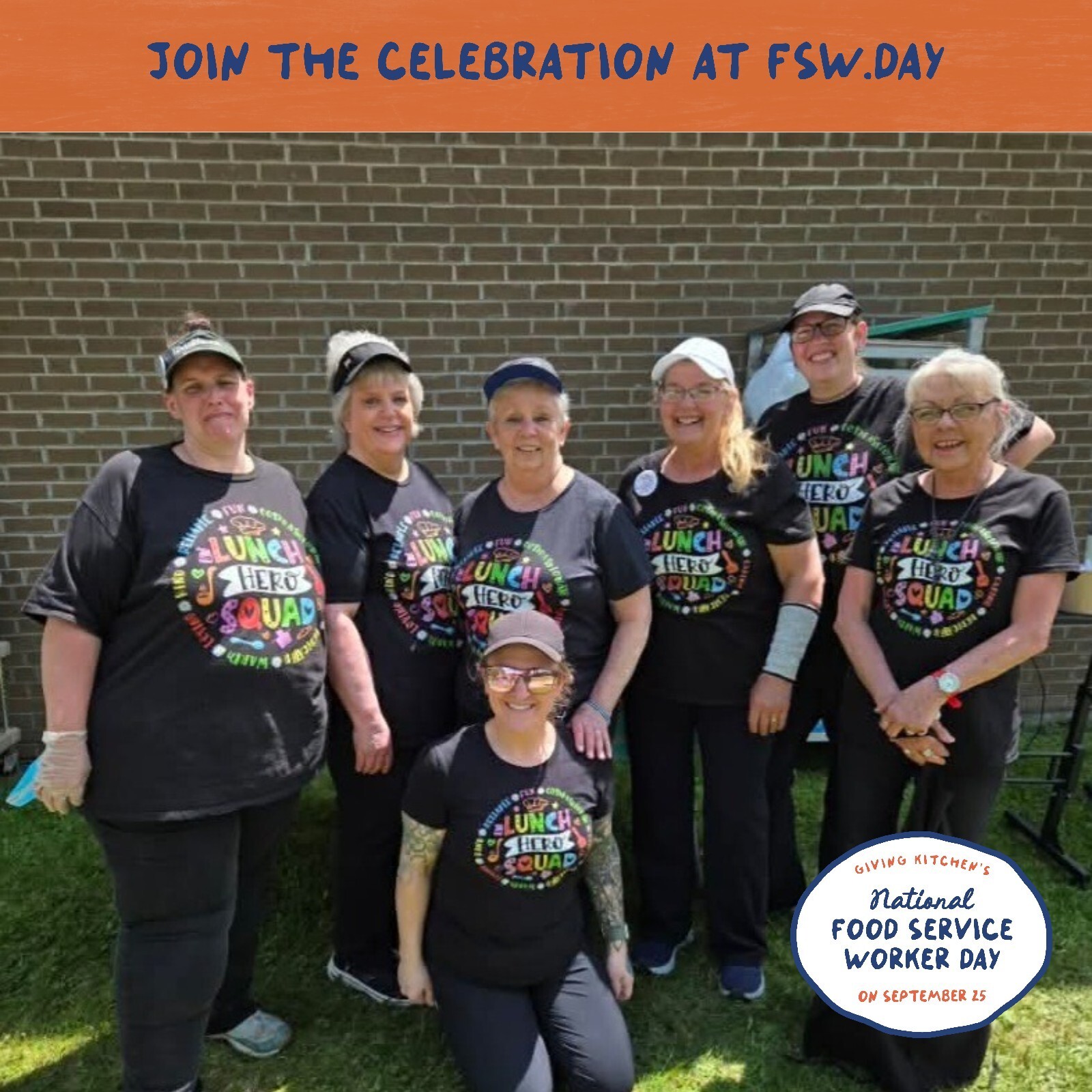 Cafeteria workers pose for a team photo