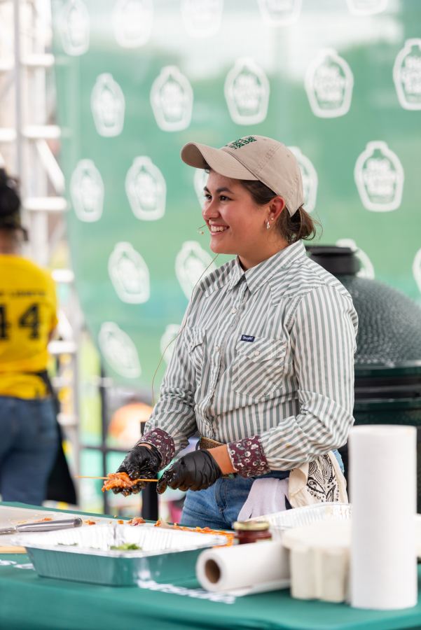 Chef stands at her station at Eggtoberfest
